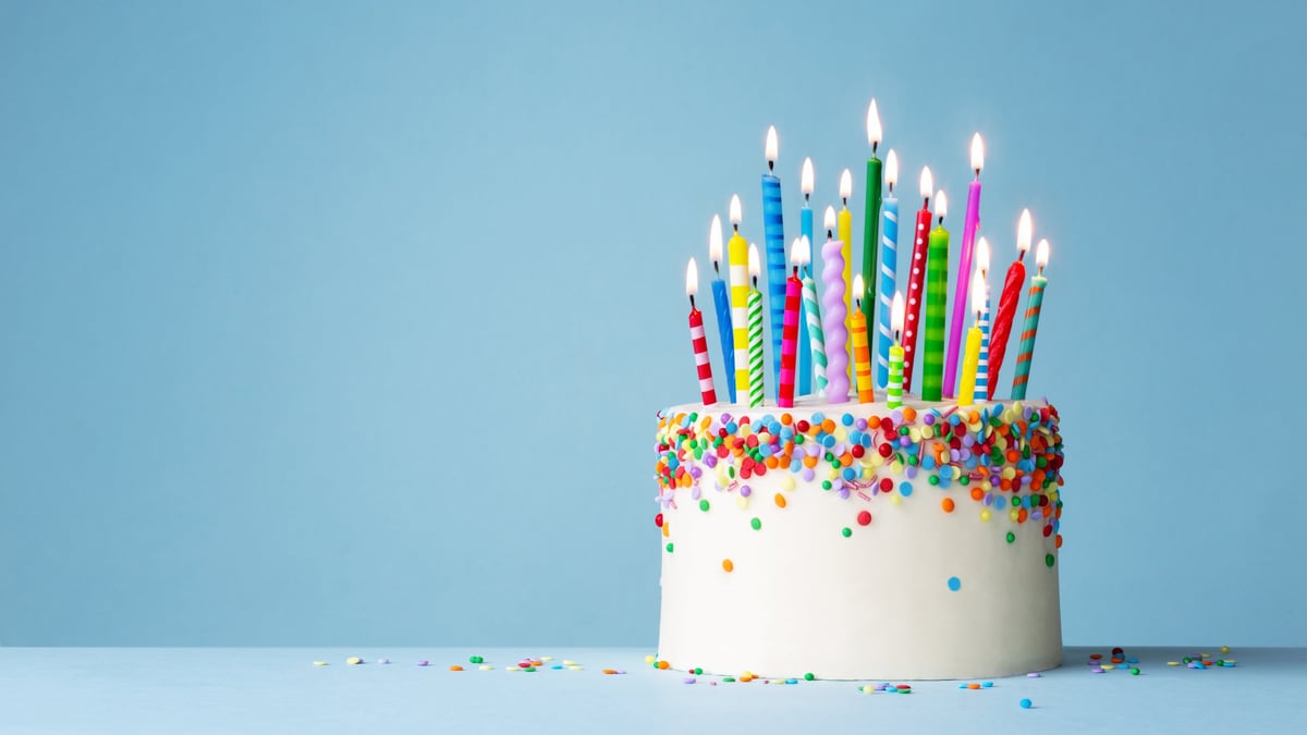 Colorful birthday cake with candles