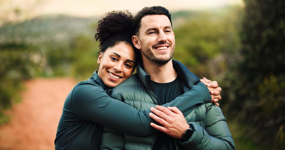 Couple hiking together on an adventure